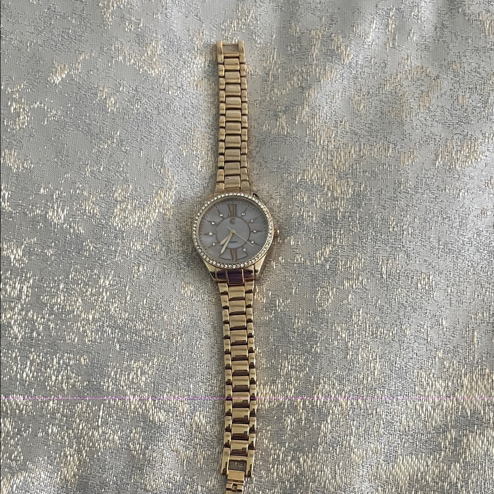 Gold colored Watch with Crystal Accents and mother of pearl dial